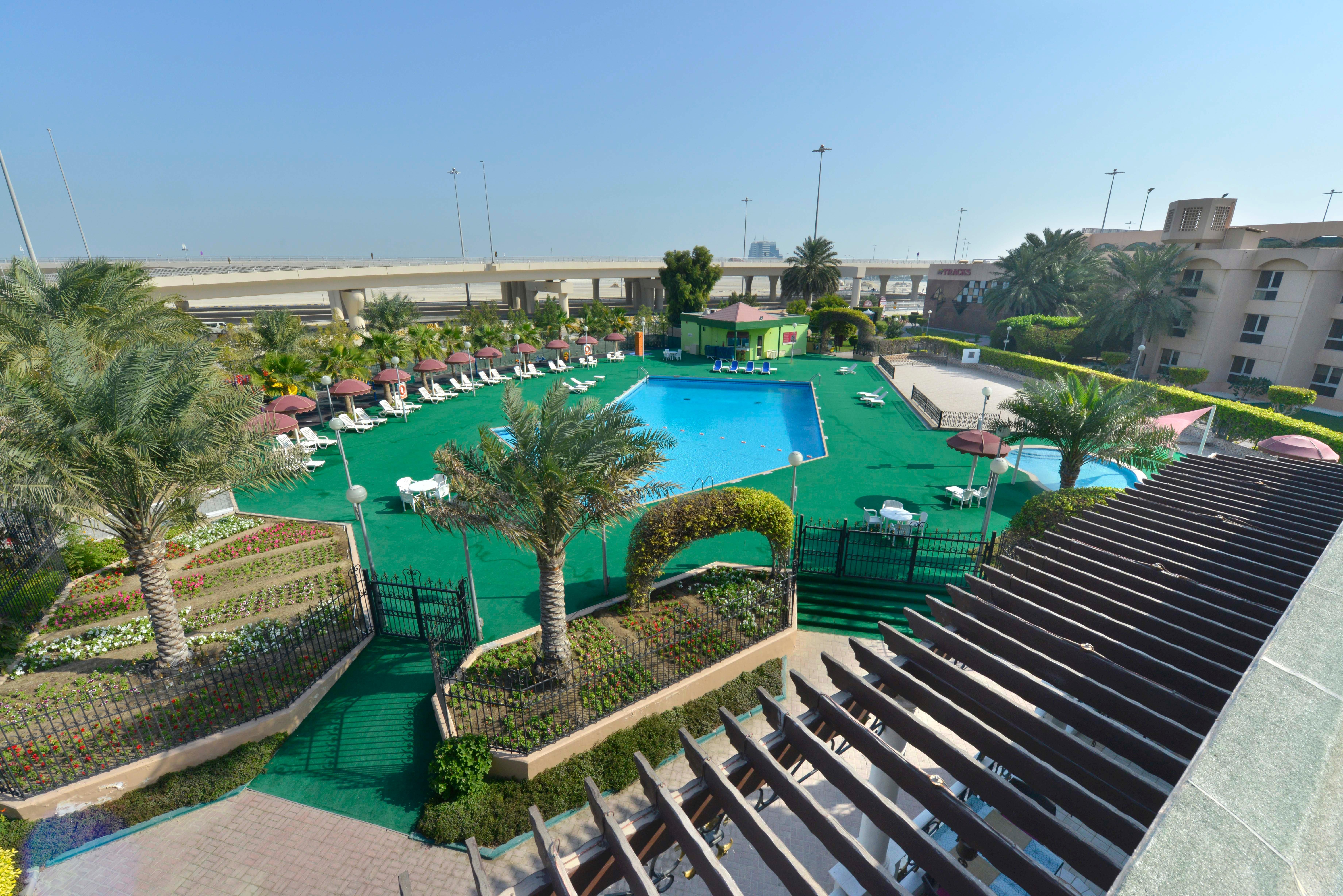 Crowne Plaza Bahrain By Ihg Hotel Manama Exterior photo The swimming pool at the complex